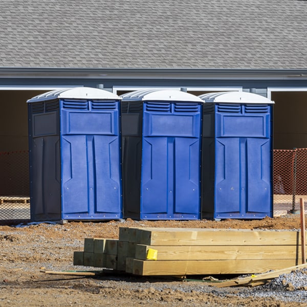 what is the cost difference between standard and deluxe portable restroom rentals in Harrison Tennessee